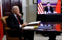 Chủ tịch Trung Quốc Tập Cận Bình và Tổng thống Mỹ Joe Biden trong cuộc điện đàm căng thẳng ngày 28-7. Ảnh: REUTERS