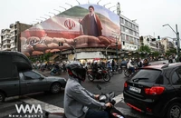 Chùm ảnh: Nhịp sống đời thường trở lại thủ đô Iran khi tiếng súng tạm ngưng