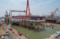 Trung Quốc hạ thủy tàu sân bay thứ ba, mang tên Phúc Kiến và có số hiệu 18. Ảnh: XINHUA