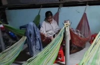 Hai vợ chồng đi xe máy nghi bị cướp bắn trên quốc lộ N2 