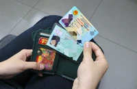 Từ 18-11, CMND không còn giá trị khi thanh toán không dùng tiền mặt
