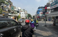 Đèn đỏ còn vài giây mà chạy cũng bị phạt