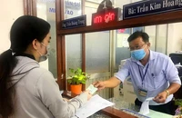 TP.HCM: Việc ngập đầu, cán bộ phường, xã vã mồ hôi 