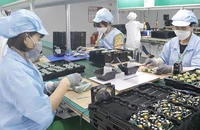 Kinh tế Việt Nam tăng tốc nhưng chịu không ít áp lực 