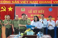 Công an và Bảo hiểm ký quy chế để chống trốn đóng bảo hiểm cho người lao động
