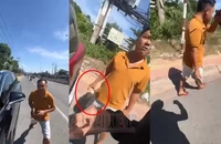 Clip: Cán bộ cảnh sát giao thông mặc đồ thường chửi thề, cầm gạch đá định đánh người