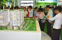 Thấy gì từ việc doanh nghiệp bất động sản báo lãi?