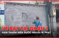 Phạt tiền 1 nam thanh niên người nước ngoài vì vẽ bậy trên mặt tiền quận 1 