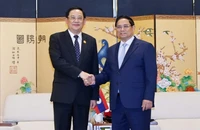 Thủ tướng Phạm Minh Chính gặp Thủ tướng Lào Sonexay Siphandone