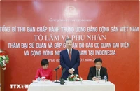 Tổng Bí thư gặp mặt cán bộ cơ quan đại diện và cộng đồng người Việt ở Indonesia