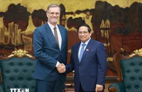 Thủ tướng Phạm Minh Chính tiếp Đại sứ Pháp tại Việt Nam Olivier Brochet