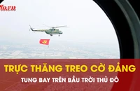 Trực thăng treo cờ Đảng, cờ Tổ quốc bay trên bầu trời Hà Nội