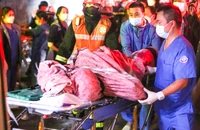 11 thi thể trong vụ phóng hỏa ở Hà Nội đã được bàn giao cho gia đình để an táng