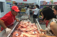 CPI tháng 11 tăng cao nhất 9 năm vì giá thịt heo leo thang 