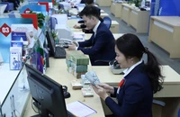 Thủ tướng yêu cầu ngành ngân hàng tiếp tục giảm lãi suất