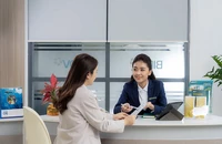 Lãi suất thấp không còn là câu chuyện chỉ xuất hiện trên tivi hay trên báo chí nữa. Ảnh: THÙY LINH
