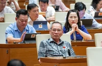 Quốc hội bàn việc thay lương cơ sở bằng mức tham chiếu để đóng BHXH