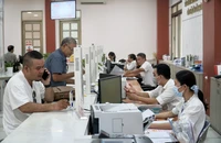 Bộ Tư pháp nói về việc hồ sơ chứng thực 'chất cao như núi'