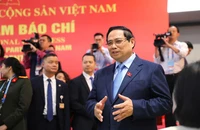 Thủ tướng Phạm Minh Chính thăm, động viên phóng viên tác nghiệp tại Đại hội XIV