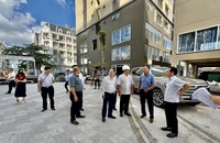 Đoàn giám sát Bộ Xây dựng đến giám sát tại một dự án bất động sản tại TPHCM. Ảnh: NGUYỄN CHÂU