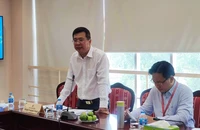 Ông Phan Thanh Tùng, Phó Giám đốc Sở Tư pháp TP.HCM báo cáo tình hình tổ chức, hoạt động và quản lý công tác giám định tư pháp. Ảnh: NGUYỄN HIỀN