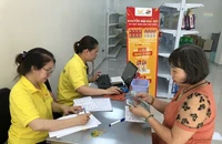 Trong kỳ chi trả tháng 7-2024, tại TP.HCM sẽ chi trả lương hưu, trợ cấp BHXH theo mức mới cho người hưởng. Ảnh" NH