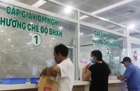 Người dân đến khám chữa bệnh BHYt tại Bệnh viện 175. Ảnh: NGUYỄN HIỀN