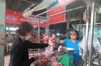 Giá heo hơi hạ nhiệt nhưng giá bán lẻ vẫn...'làm ngơ'