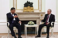Tổng thống Nga Vladimir Putin (phải) gặp Chủ tịch Trung Quốc Tập Cận Bình tại Điện Kremlin, thủ đô Moscow (Nga) ngày 20 -3. Ảnh: SPUTNIK