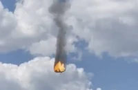 Trực thăng Mi-8 rơi ở vùng Bryansk (Nga) gần biên giới Ukraine hôm 13-5. Ảnh: TASS