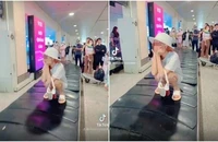 Xác minh, xử lý nghiêm nữ hành khách tạo dáng trên băng chuyền hành lý