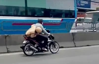 Truy tố nam thanh niên trong vụ CSGT bám yên xe máy trên Quốc lộ 1