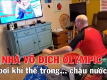 Hai cha con đoạt HCV Olympic nhờ ngụp lặn trong.....
