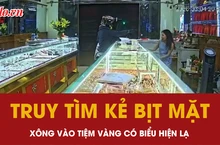 Video: Người đàn ông bịt mặt xông vào tiệm vàng với biểu hiện lạ