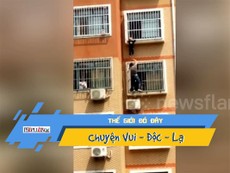 Video: Nghẹt thở cứu bé trai lơ lửng ngoài ban công tầng 7