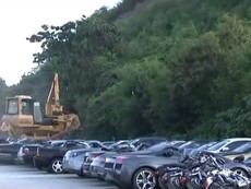 Hàng chục xe siêu sang nhập lậu bị nghiền nát