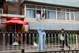 Bắc Kinh ‘chạy đua với thời gian' để ngăn chặn đợt bùng phát dịch COVID-19 mới nhất. Ảnh: Carlos Garcia Rawlins/REUTERS