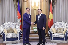 Thủ tướng Phạm Minh Chính gặp Thủ tướng Campuchia Hun Manet nhân dịp tham dự Hội nghị Cấp cao ASEAN-GCC tháng 10-2023 tại Saudi Arabia. Ảnh: TTXVN.