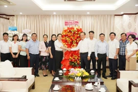 Giám đốc Sở Tư pháp TP.HCM chúc mừng báo Pháp Luật TP.HCM nhân ngày 21-6