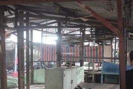 Người đàn ông chết trong tư thế treo cổ giữa chợ ở Biên Hòa
