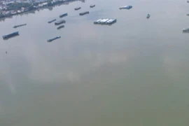 Tìm tung tích thi thể người đàn ông trôi sông Đồng Nai