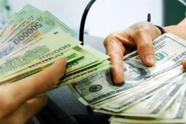 Giá đôla Mỹ đột ngột hạ nhiệt nhưng vẫn ở mức cao