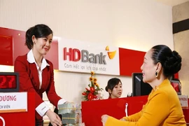 Ngân hàng 'ăn theo' thượng đỉnh Mỹ-Triều, tăng lãi suất 