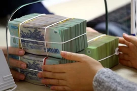 Thêm một số ngân hàng giảm lãi suất tiền gửi tiết kiệm 