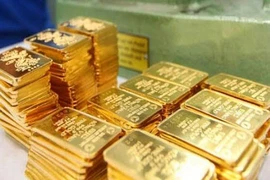 Giá vàng tại Việt Nam 'kiên quyết' không giảm theo thế giới