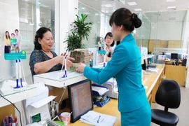 Kiểm soát chặt tiền đổ vào nhà đất, chứng khoán 