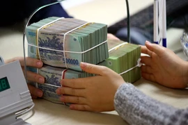 Dòng tiền nhàn rỗi bất ngờ quay lại ngân hàng