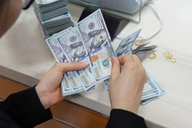 Chênh lệch giá mua bán USD 'chợ đen' bất thường 