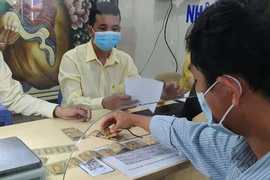 Vàng miếng SJC bất ngờ tăng phi mã