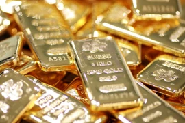 Nhờ đâu giá vàng thế giới tăng gần 100 USD?